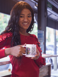 Thumbnail for a woman in a red shirt holding a coffee mug