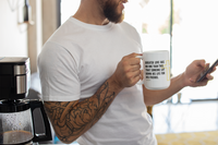 Thumbnail for a man holding a coffee mug and a cell phone