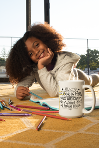 Thumbnail for a little girl laying on the ground with a coffee mug