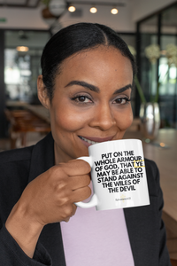 Thumbnail for a woman holding a coffee mug with a quote on it