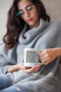 Thumbnail for a woman sitting on a chair holding a book