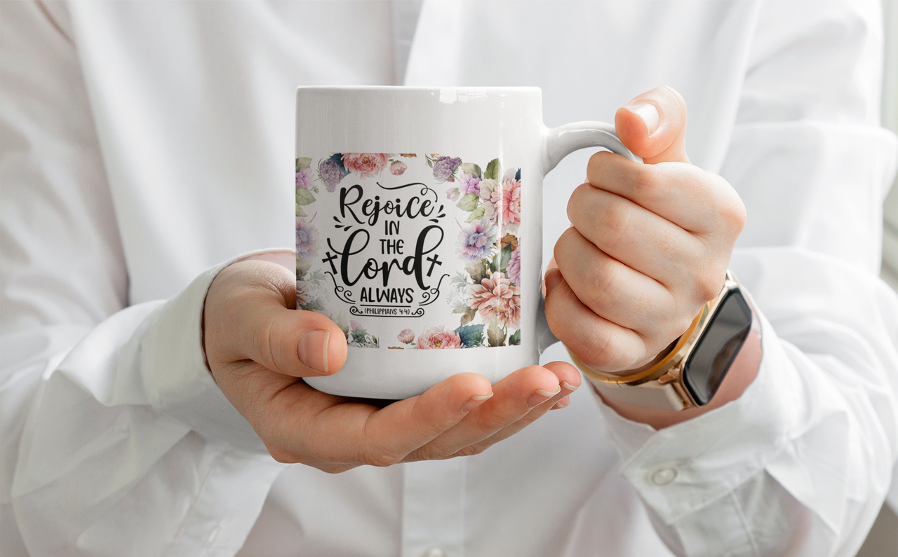 a woman holding a coffee mug with a quote on it