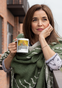 Thumbnail for a woman is holding a coffee mug and posing for a picture