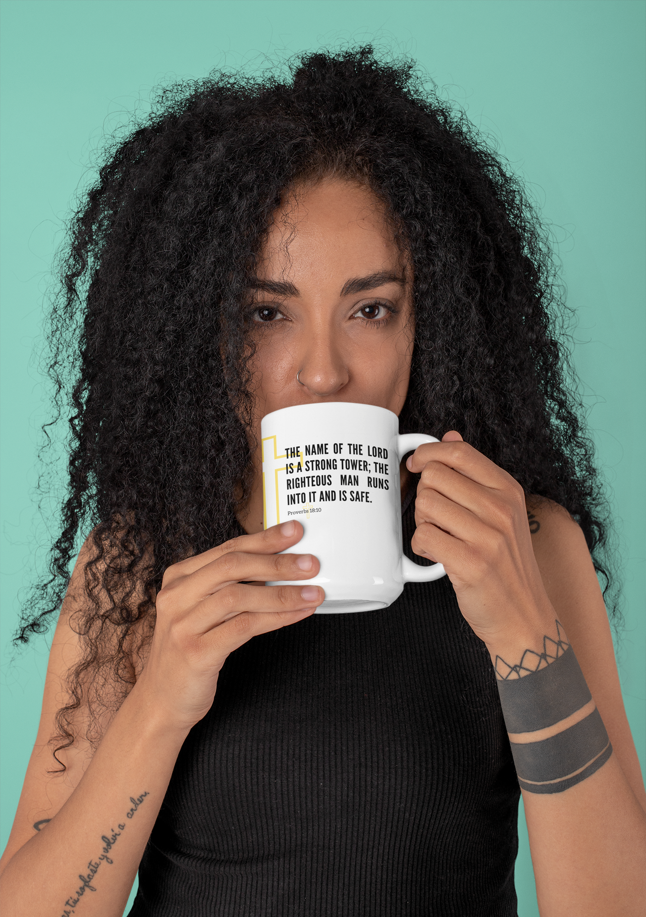 a woman holding a coffee mug with a quote on it