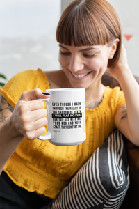 Thumbnail for a woman sitting on a couch holding a coffee mug