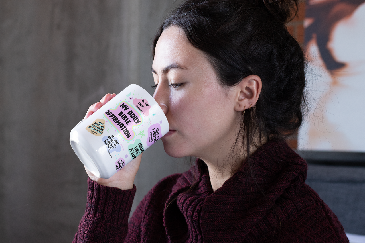 a woman drinking from a cup of milk