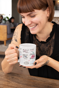 Thumbnail for a woman sitting at a table holding a coffee mug