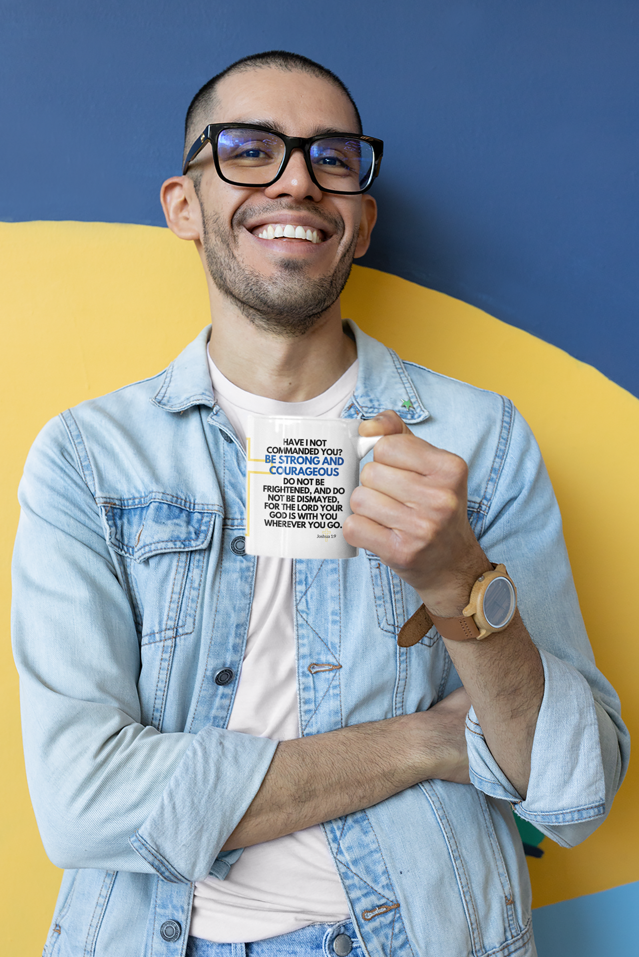 a man wearing glasses and a denim jacket